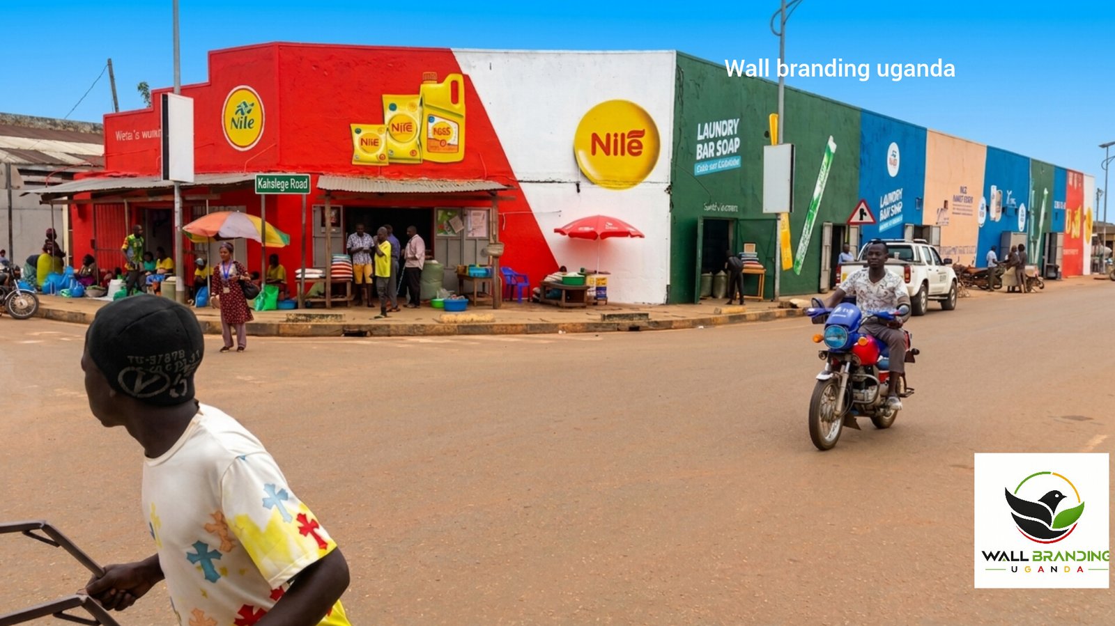 Full commercial building storefront wall branding and painted advertisement for Nile products in Uganda